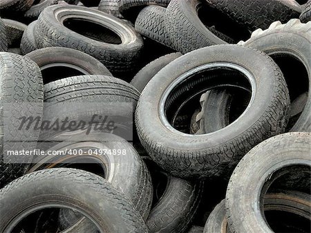 A heap of discarded car and truck tires.