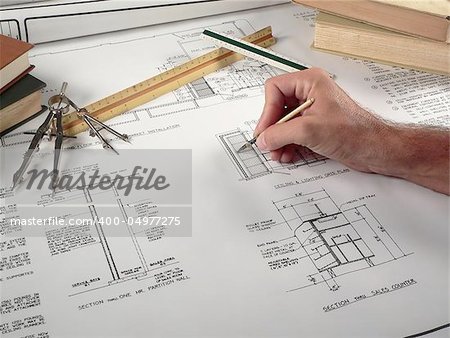 An architect prepares a set of drawings