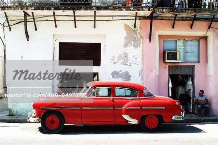 Classic red American car in Havana street