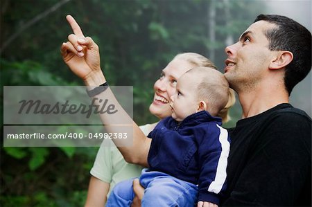 Mixed Hispanic Family with Cute Baby Boy Experienicing Nature in the Rain Forest