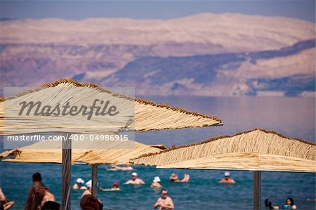 Sunshades on the Dead Sea beach from Israel