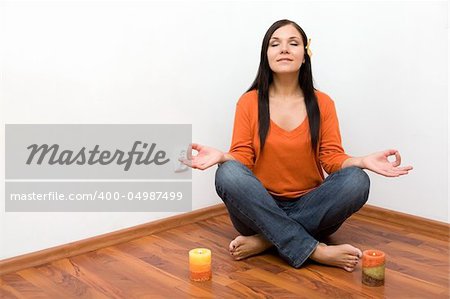 attractive brunette woman meditation at home