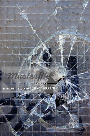 Broken glass surface texture detail. Abstract background pattern.