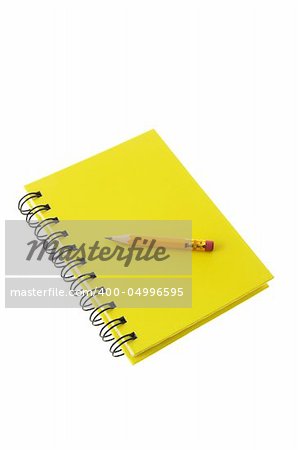 Short Pencil on Note Book on White Background