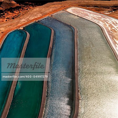 Aerial detail of tailing ponds for mineral waste in rural Utah, United States.