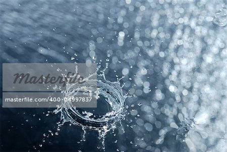 Splash. A water table with effective drops stains on water