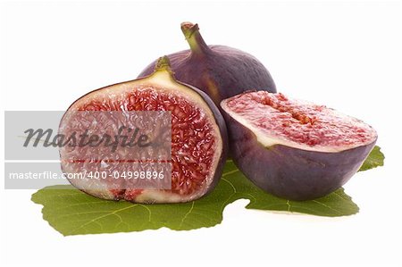 fresh figs. fruits and leaf isolated on the white background