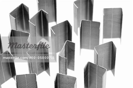 Black and white image of staples on white background