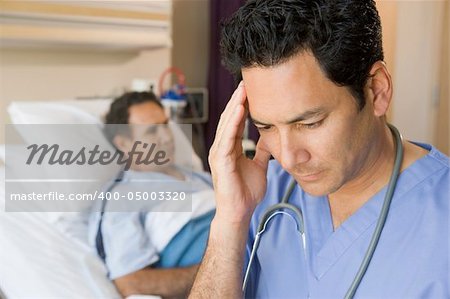 Doctor Looking Frustrated In Patients Room