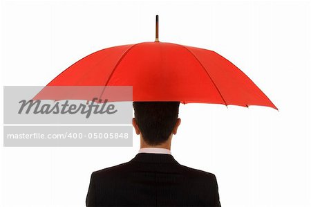 A man protected by his umbrella