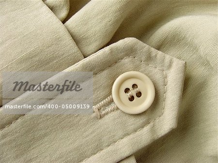 unbleached linen clothes fragment with button