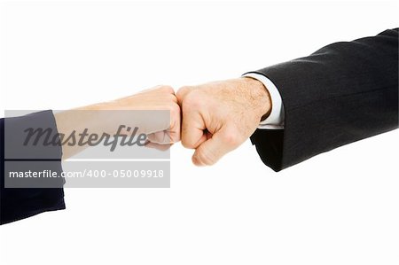 Female and male business people giving a fist bump.  Isolated on white.