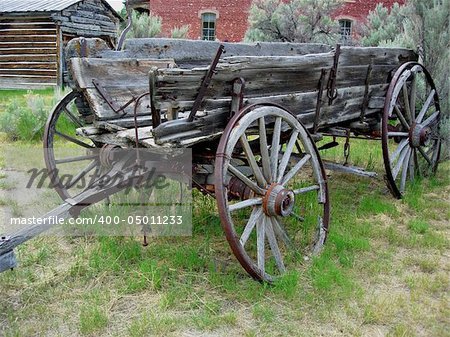 An old wagon abandoned in field