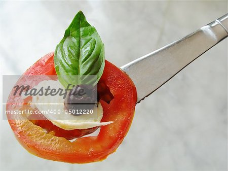 close up photo of italian caprese tomato mozzarella olive salad