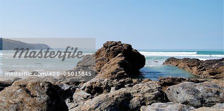 Summers day with blue sky over the surf, Porthtowan, Cornwall