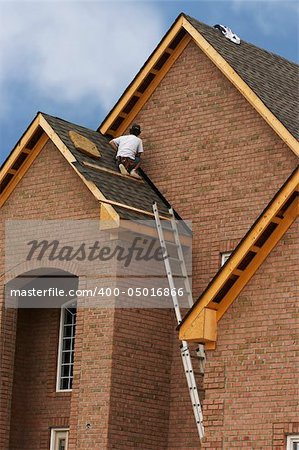 worker on roof