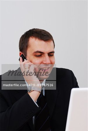 Entrepreneur talking on the phone in the office