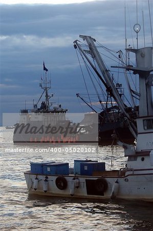 Various scenic shots of boats fishing or traveling the Naknek River in Bristol Bay, Alaska during the red salmon season.
