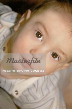 close up portrait of a baby looking up