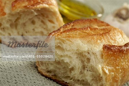 Sourdough Bread and Olive Oil with Narrow Depth of Field