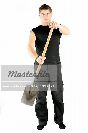 man in black ready to work using shovel