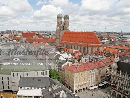 A panoramic view of the old city of Munich, with its landmark, Frauenkirche, dominating