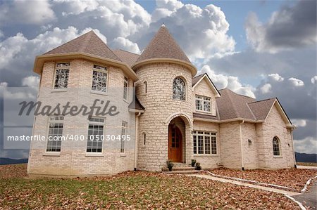 Majestic Newly Constructed Home Facade on a Blustry Day