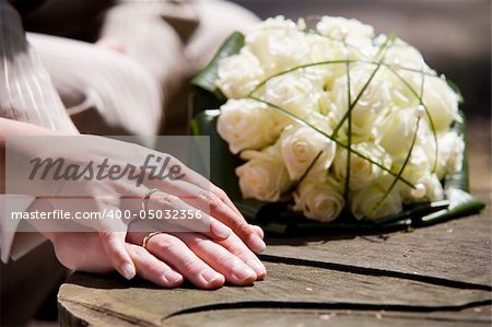 bride and groom holding each others hand