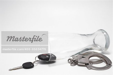 Drunk Driving Concept - Beer, Keys and Handcuffs