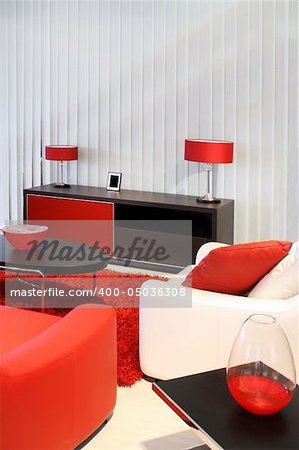 Modern living room with red and black furniture