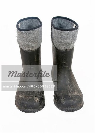 Dark high boots for working in the garden isolated on a white background.