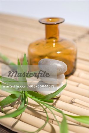 zen stones on bamboo background meditation concept