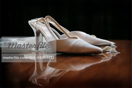 Wedding Shoes on shiny table