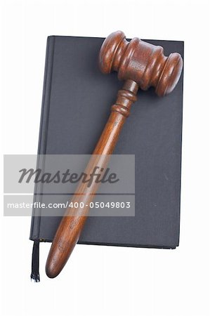 Wooden gavel from the court and law book isolated on white background. Shallow depth of file