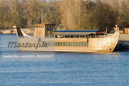 Large wooden boat on the blue water