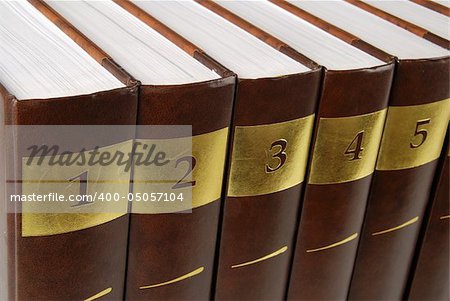 Five volumes of encyclopedia - books in a row