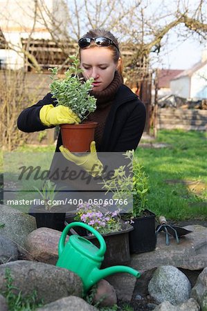 woman is working in garden