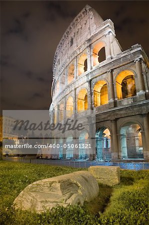 Colosseum arena, night view, vertical frame. Rome, Italy.