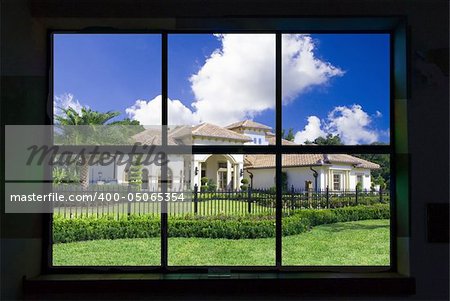 Looking through a window at an upscale home