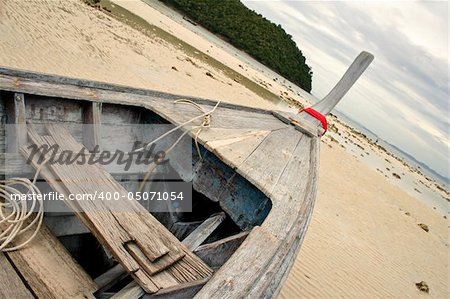 traditional thai longtail boat on beach koh phi phi thailand