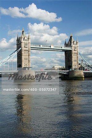 tower bridge crossing the thames river in london england
