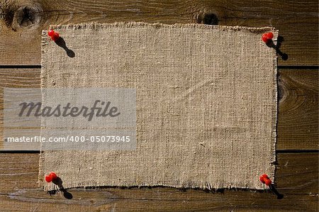 Textile Patch On Dark Wooden Texture