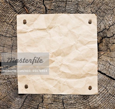 Old Paper On Wooden Background. Ready For Your message.