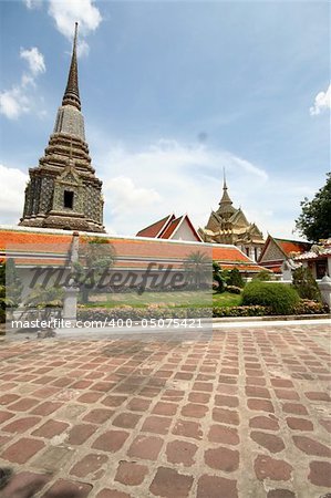 Wat Phra Chetuphon. Entrance and stupas of The Temple of the Golden Reclining Buddha in Bangkok, Thailand, Asia.