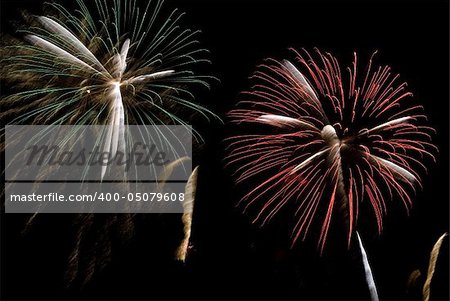 Fireworks being set off against a dark sky