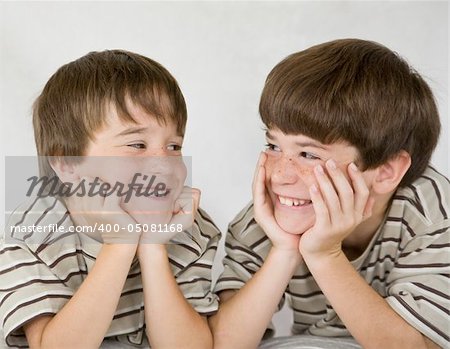 Two Little Boys Laughing Together