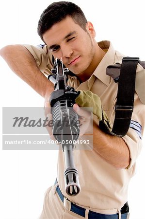 young soldier going to shoot with gun on an isolated background