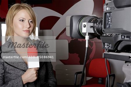 stand up transmission with serious press woman in front of the video camera