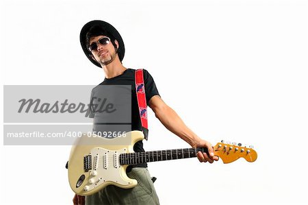 Portrait of young cool man holding electric guitar isolated