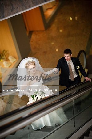 bride and groom in metro